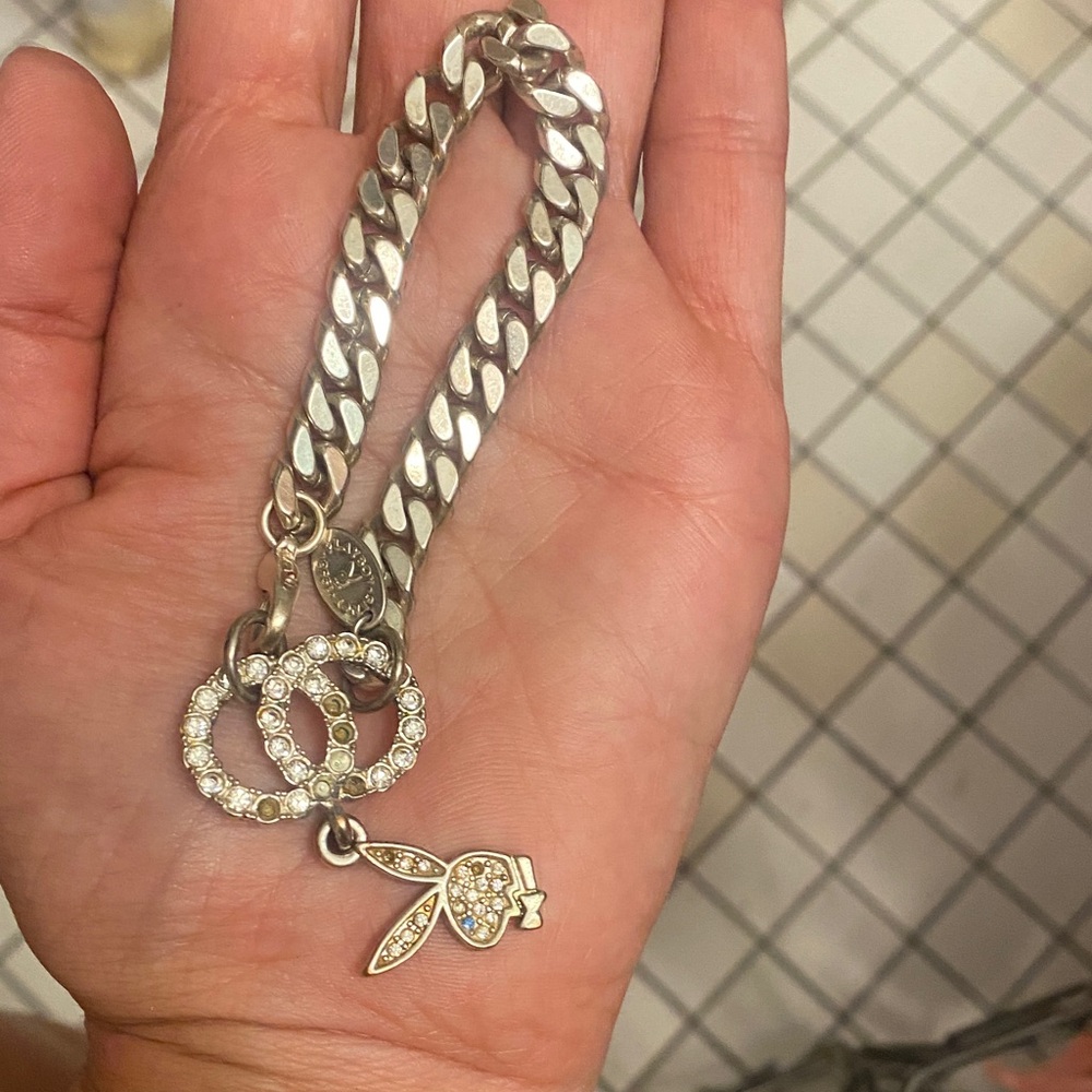 Authentic playboy brand Elegant Silver tone color and Rhinstone Charm Bracelet